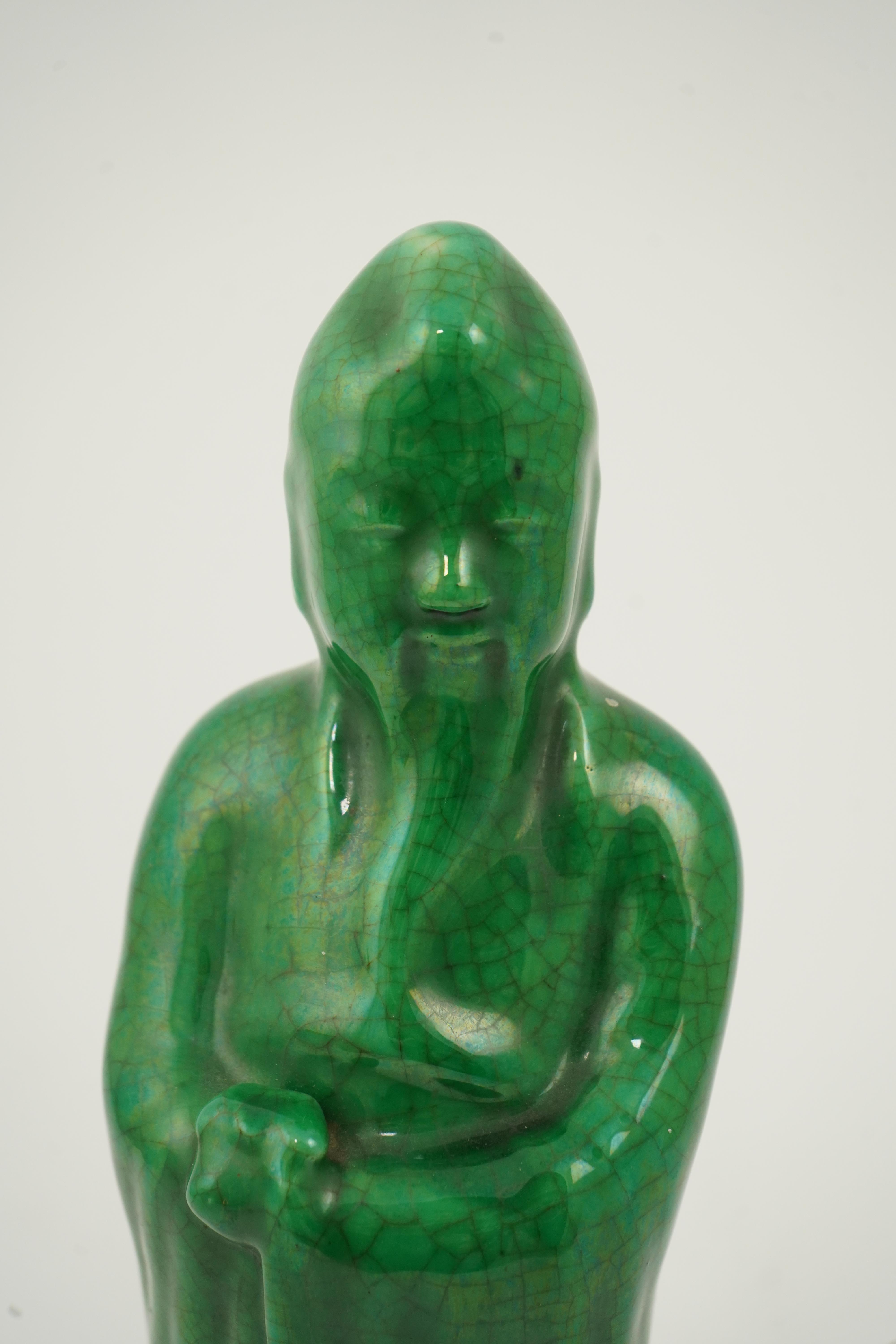 A Chinese green crackle-glazed figure of Shouxing, 18th/19th century